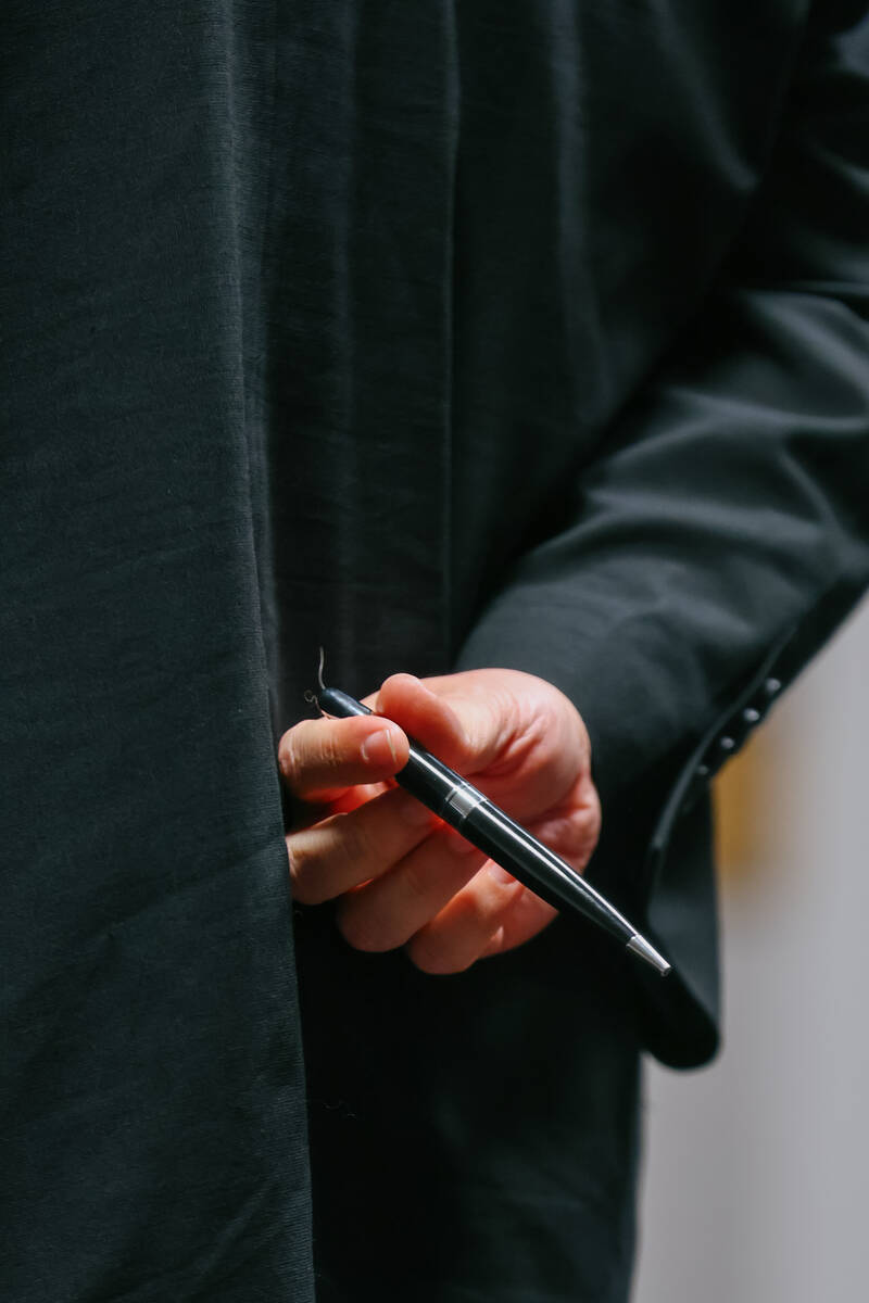 Logan Gifford’s attorney Timothy Treffinger fidgets with a pen behind his back as he addresse ...