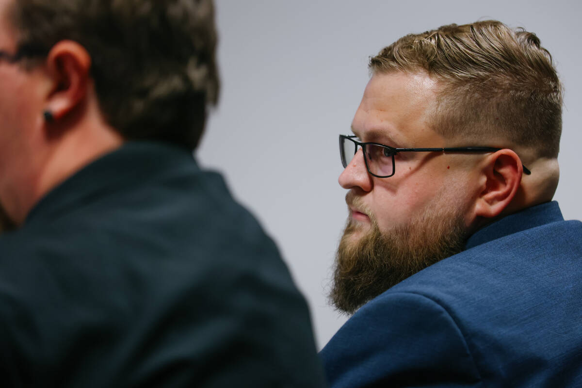 Logan Gifford looks at his attorney Timothy Treffinger during a hearing about Gifford’s 16-ye ...