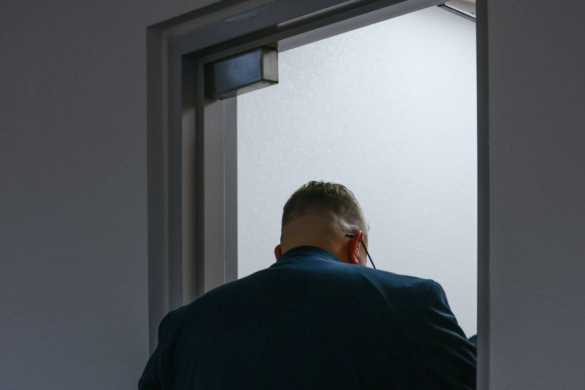 Logan Gifford walks out of the courtroom after a hearing about Gifford’s 16-year-old brother ...