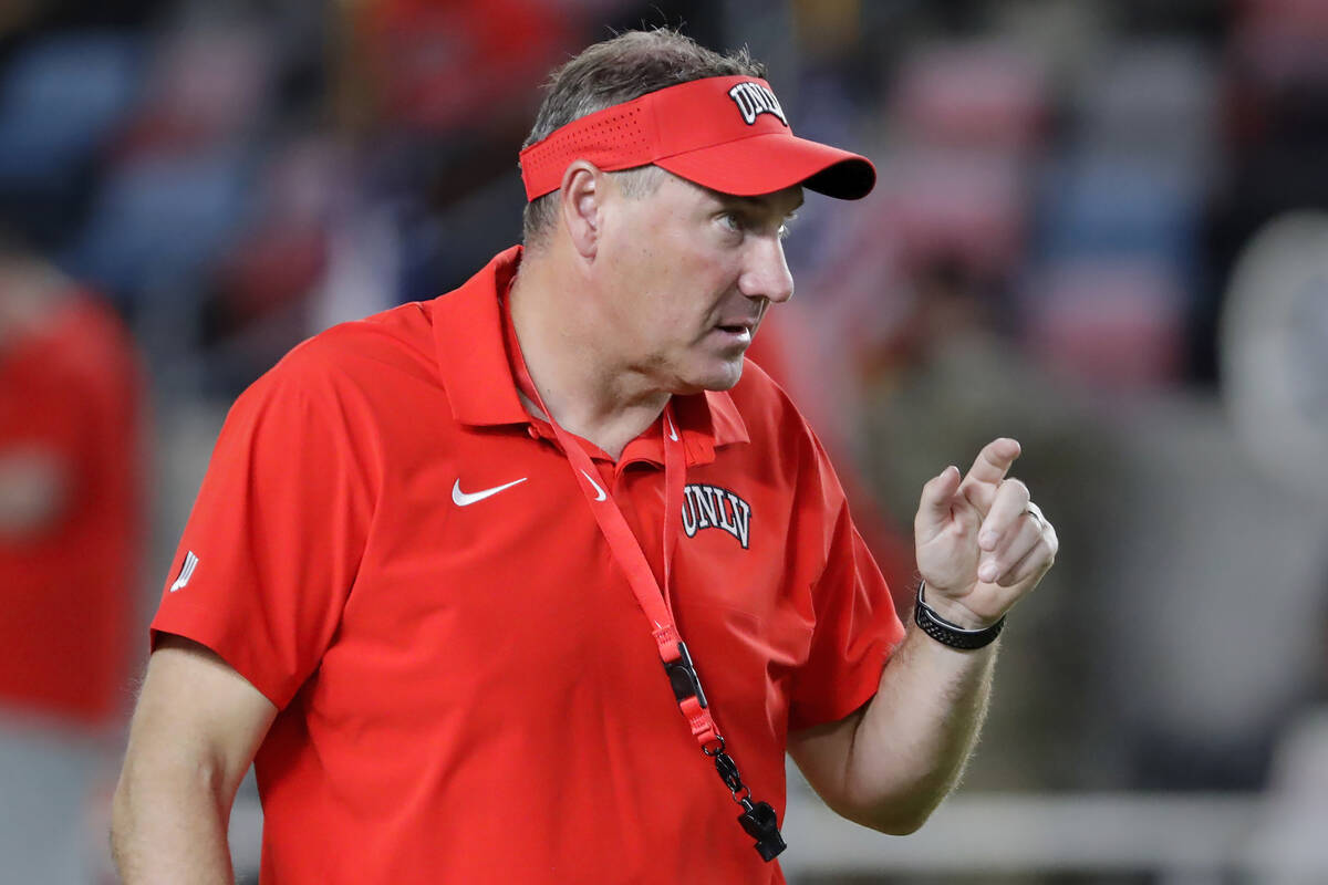 UNLV head coach Dan Mullen watches warm ups before their game against Sam Houston State on Frid ...