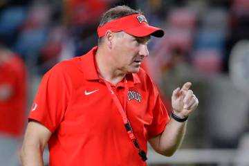 UNLV head coach Dan Mullen watches warm ups before their game against Sam Houston State on Frid ...