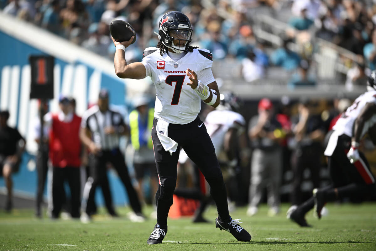 Houston Texans quarterback CJ. Stroud (7) throws a pass Jacksonville Jaguars during the second ...