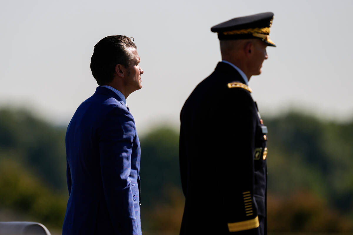 FILE - Defense Secretary Pete Hegseth, left, and Army Chief of Staff Gen. Randy George review t ...