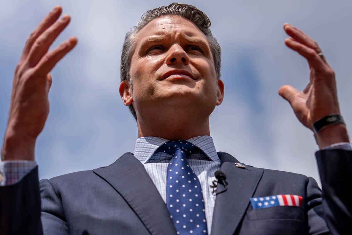 FILE - Secretary of Defense Pete Hegseth speaks to reporters at the Pentagon, July 16, 2025, in ...