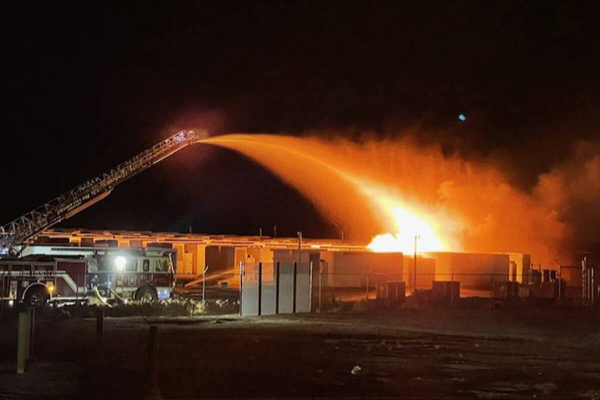 Crews respond to a lithium battery fire Tuesday, Sept. 23, 2025, at the Townsite Solar site in ...