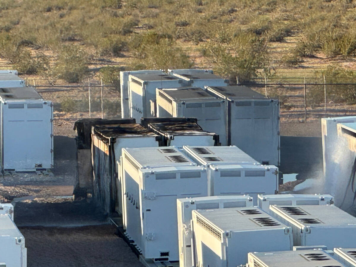 A lithium battery fire continues to smolder Wednesday, Sept. 24, 2025, at the Townsite Solar si ...