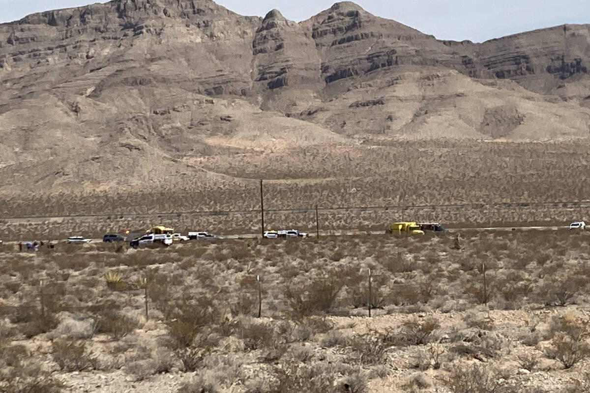 Law enforcement and emergency responder vehicles at the scene of a skydiving incident in which ...