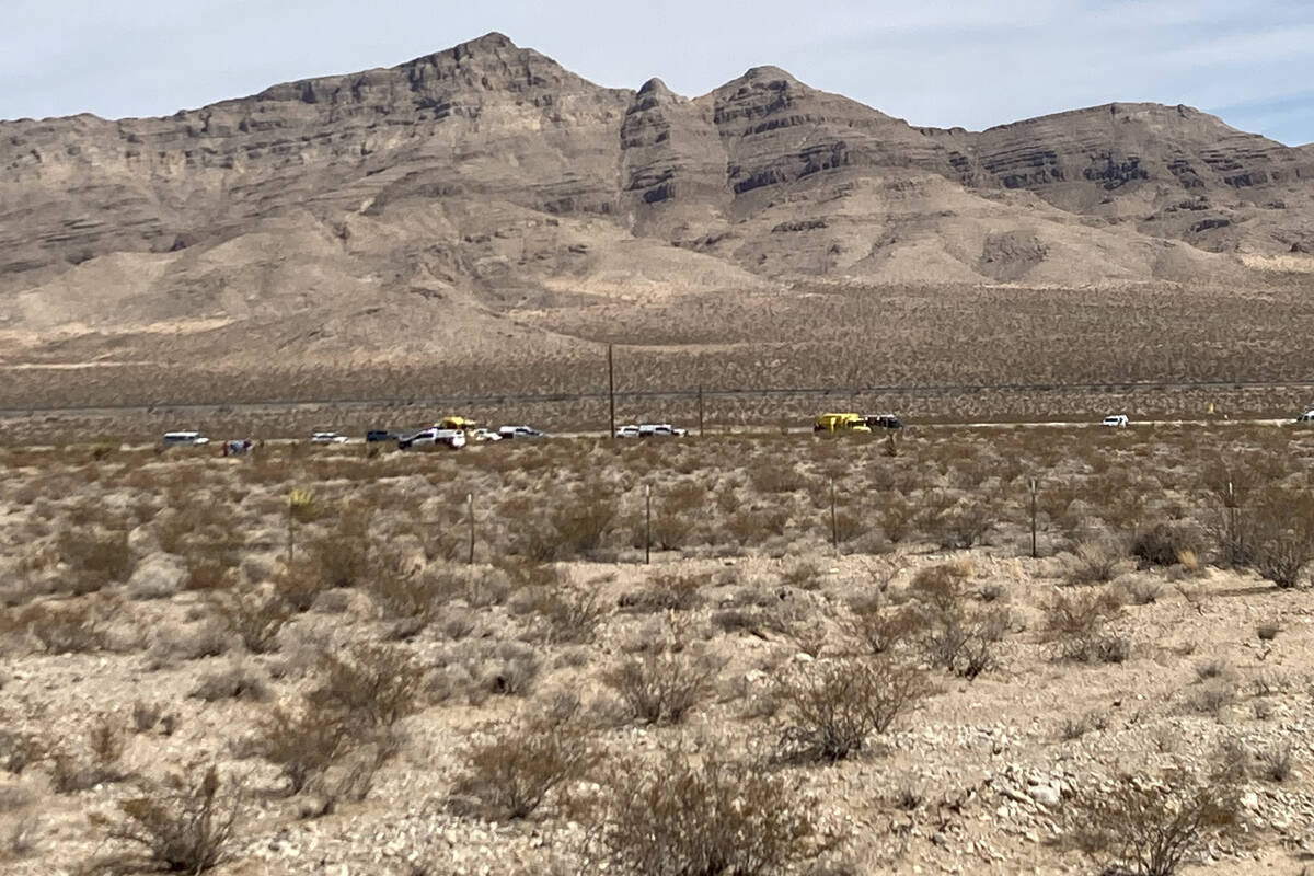 Law enforcement and emergency responder vehicles at the scene of a skydiving incident in which ...