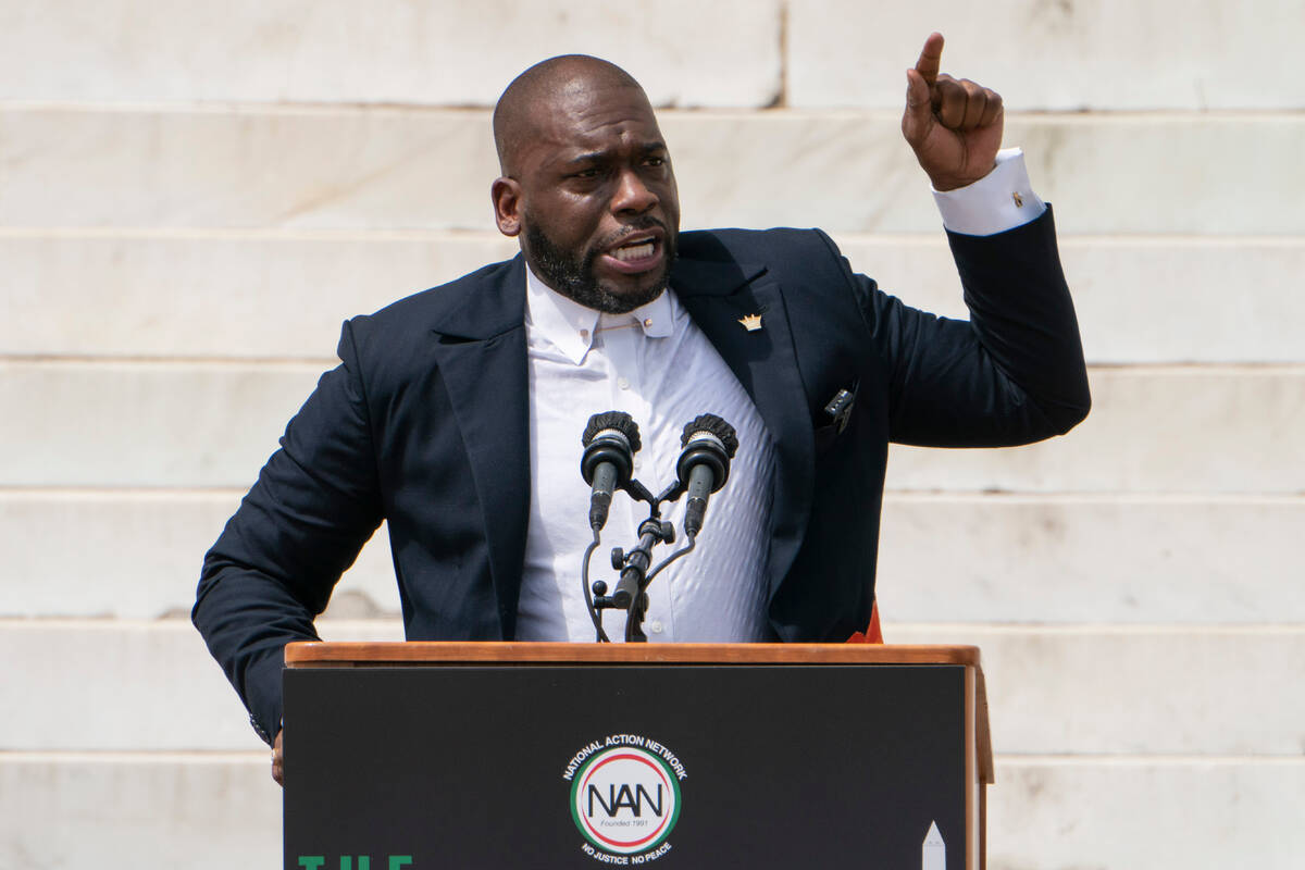 Jamal Bryant, senior pastor of New Birth Missionary Baptist Church, speaks during the March on ...