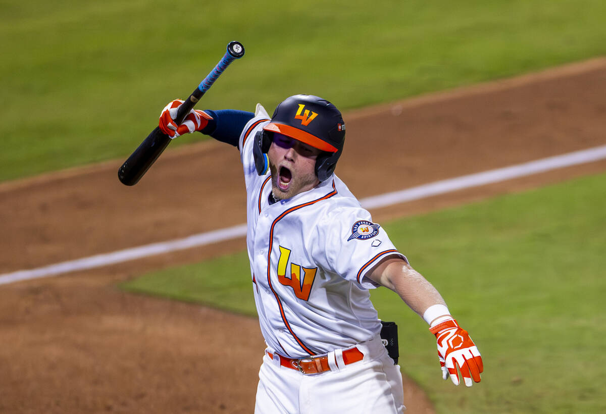 Aviators infielder Luke Mann (4) celebrates a two-run homer that sealed their win over the Taco ...