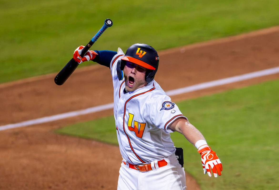 Aviators infielder Luke Mann (4) celebrates a two-run homer that sealed their win over the Taco ...