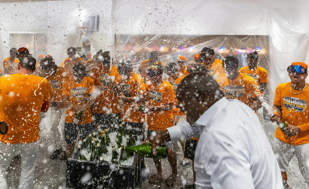 Legendary player Dave Stewart, right, joins the Aviators in a champagne shower as they celebrat ...