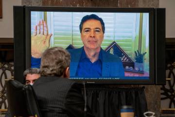 Former FBI director James Comey is sworn via videoconference before testifying during a Senate ...