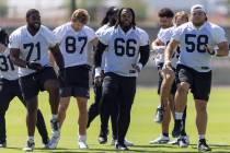 Raiders, from left, DJ Glaze (71), Michael Mayer (87), Dylan Parham (66) and Jackson Powers-Joh ...