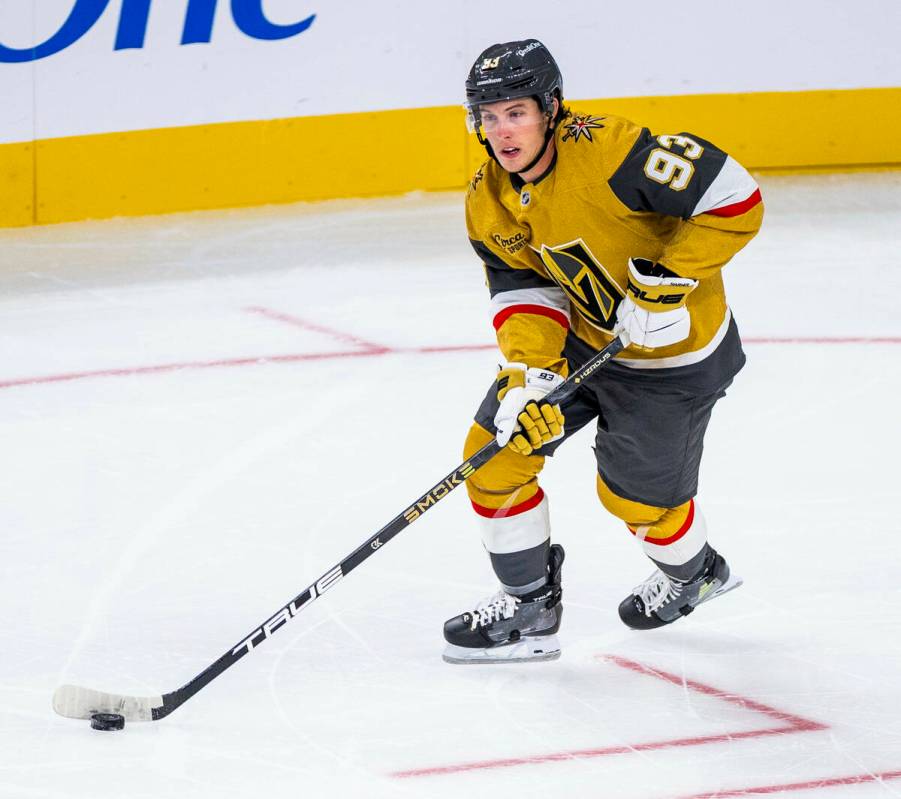 Golden Knights right wing Mitch Marner (93) advances the puck against the Utah Mammoth during t ...