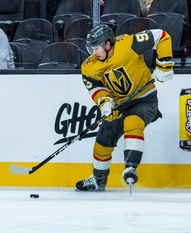 Golden Knights right wing Mitch Marner (93) takes control of the puck against the Utah Mammoth ...