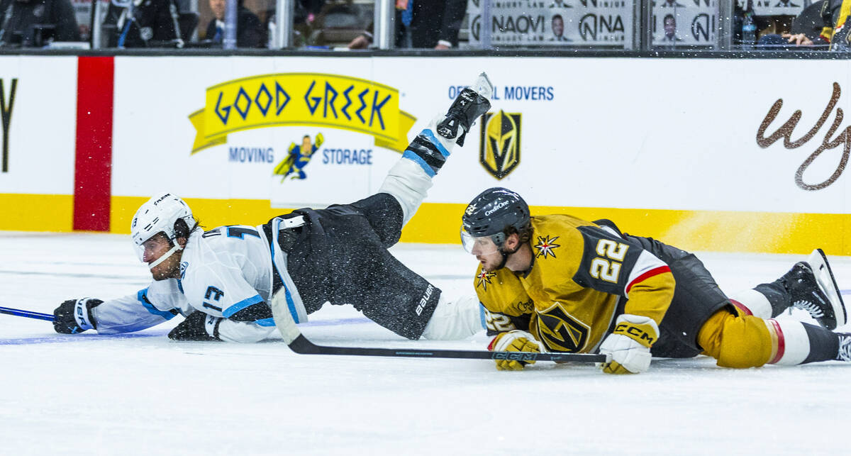 Utah Mammoth left wing Brandon Tanev (13) falls over Golden Knights right wing Cole Schwindt (2 ...