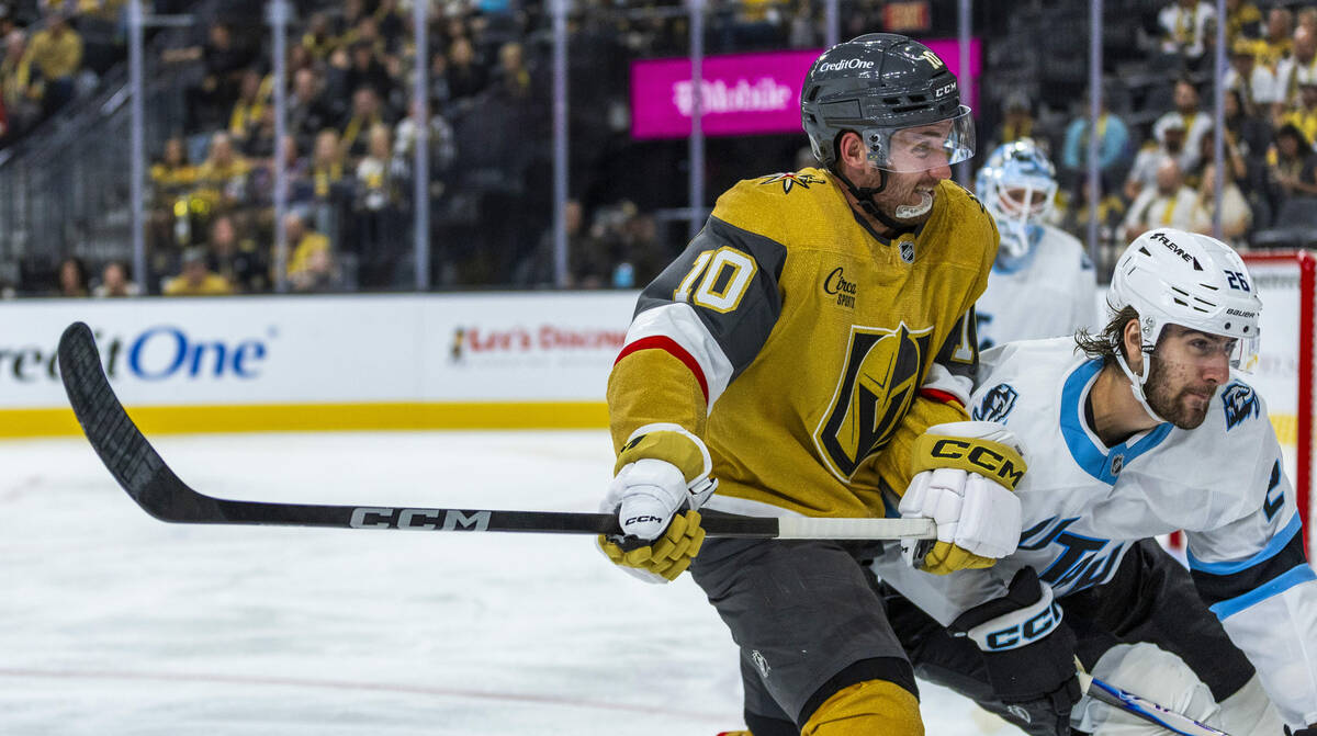 Golden Knights center Colton Sissons (10) looks to the pouch with Utah Mammoth defenseman Dmitr ...
