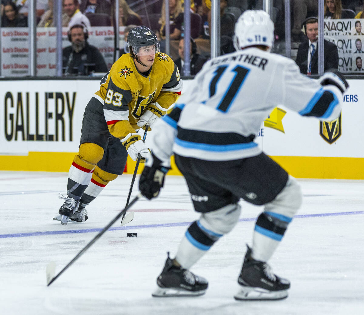 Golden Knights right wing Mitch Marner (93) drives to the net as Utah Mammoth right wing Dylan ...