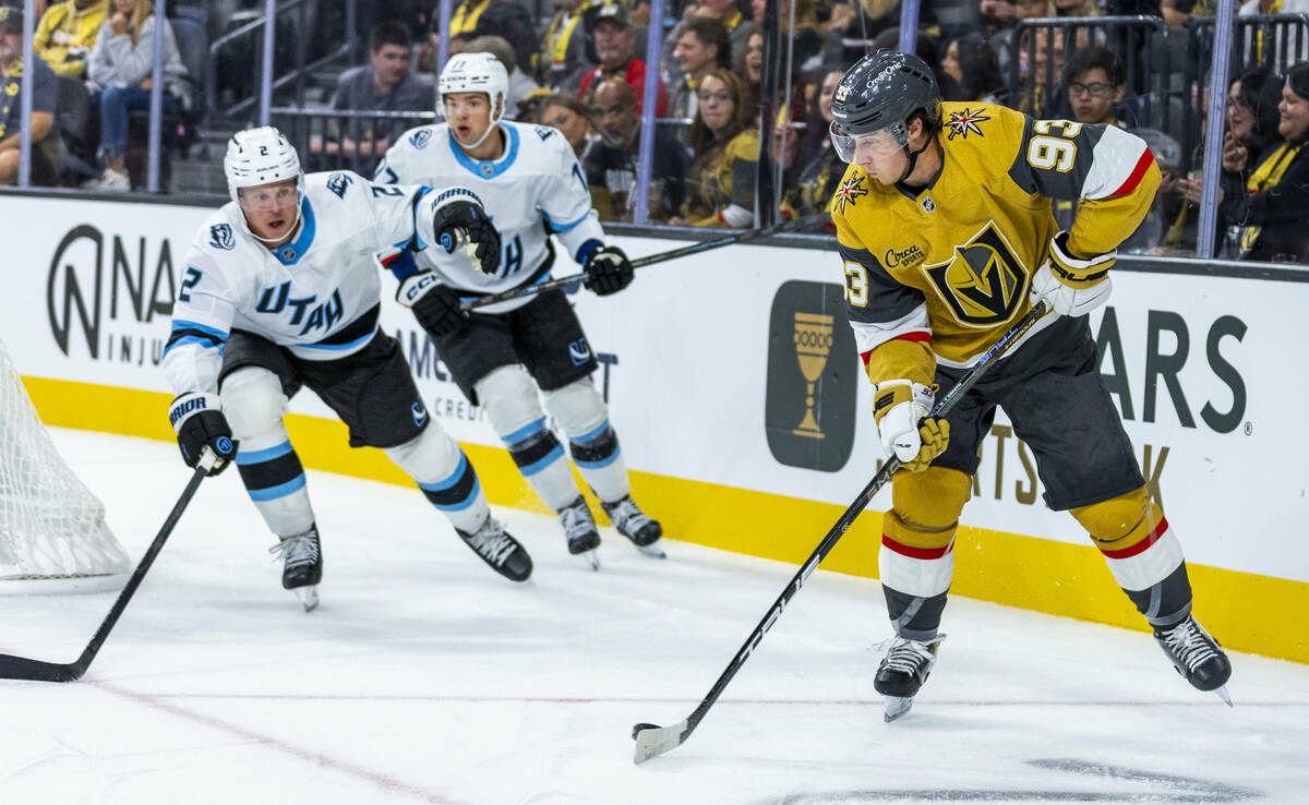 Golden Knights right wing Mitch Marner (93) looks to pass near the net as Utah Mammoth defensem ...