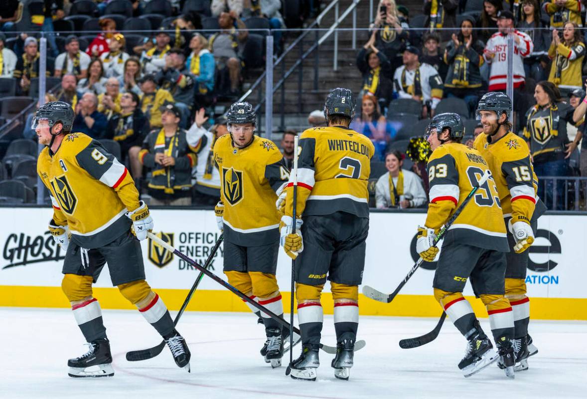 Golden Knights center Jack Eichel (9) and teammates celebrate his goal against the Utah Mammoth ...