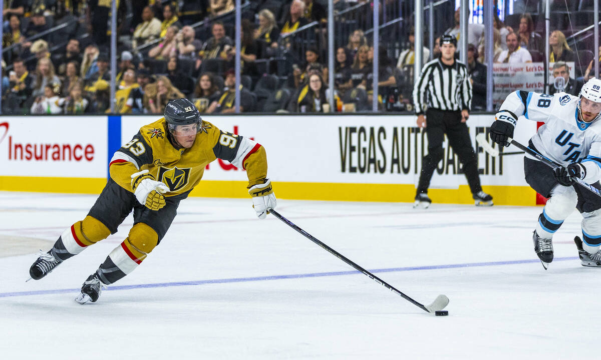 Golden Knights right wing Mitch Marner (93) advances to the net as Utah Mammoth defenseman Nate ...