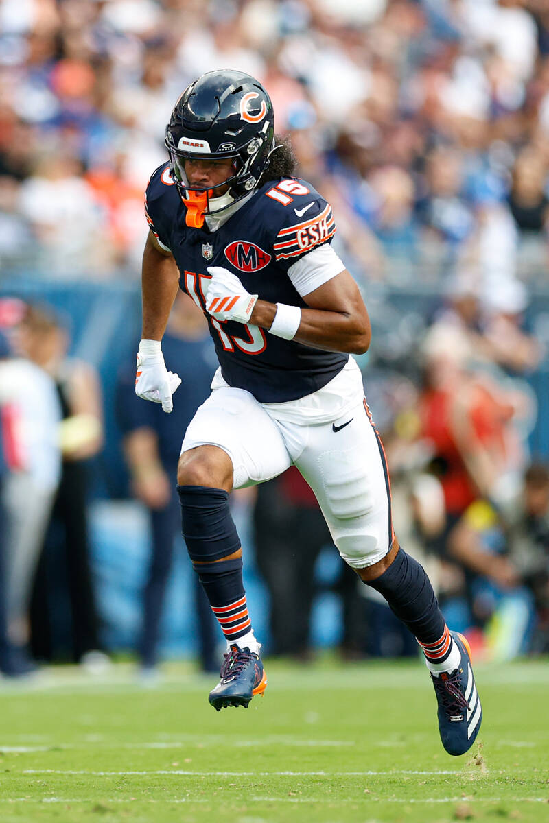 Chicago Bears wide receiver Rome Odunze (15) runs on the field during the first half of an NFL ...