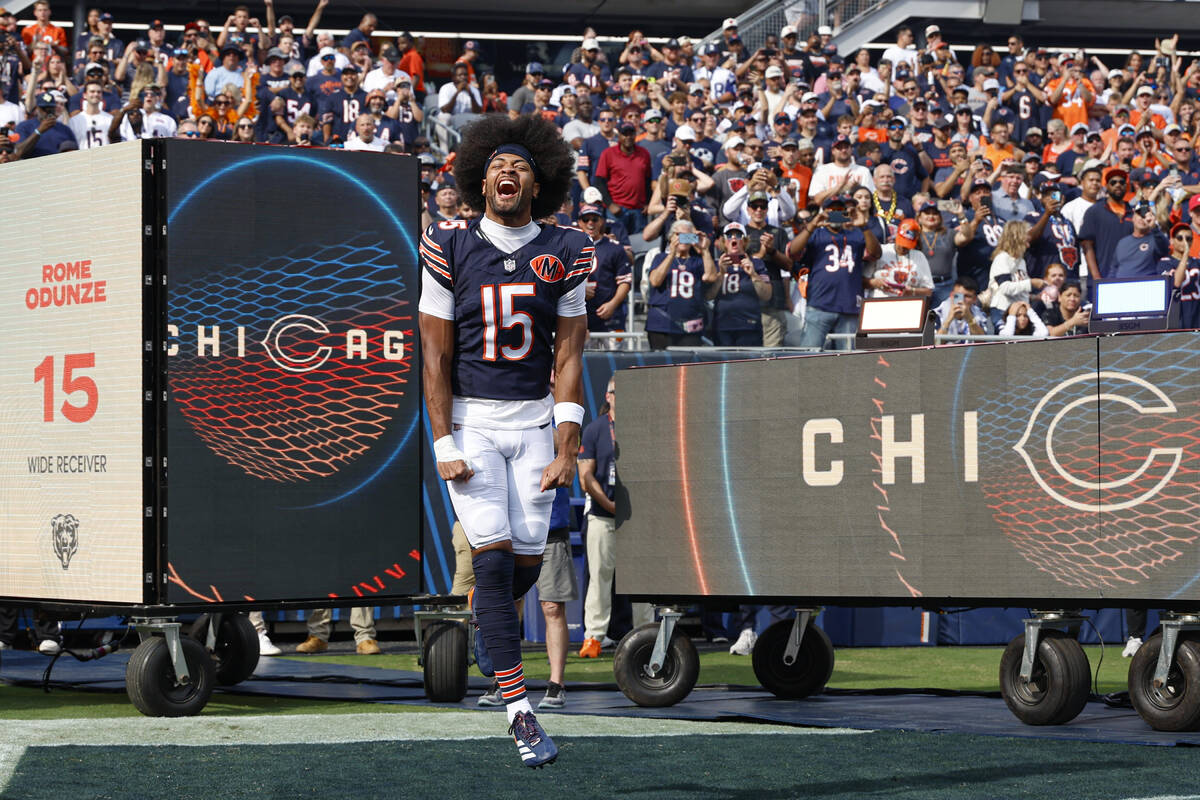 Chicago Bears wide receiver Rome Odunze (15) arrives on the field before an NFL football game a ...