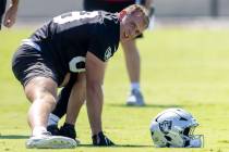 Raiders tight end Brock Bowers (89) stretches during the team’s practice at the Intermou ...