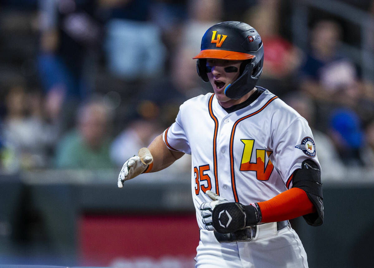 Aviators outfielder Ryan Lasko (35) celebrates heading to the dugout after hitting a two-run ho ...