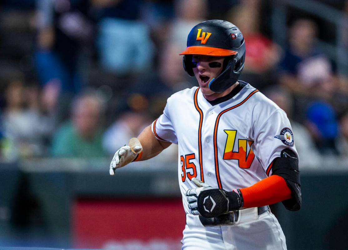 Aviators outfielder Ryan Lasko (35) celebrates heading to the dugout after hitting a two-run ho ...