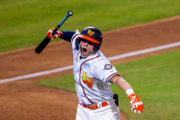Aviators infielder Luke Mann (4) celebrates a two-run homer that sealed their win over the Taco ...