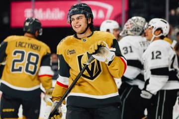 Golden Knights center Mathieu Cataford (8) smiles as fans react to a failed goal attempt by a t ...