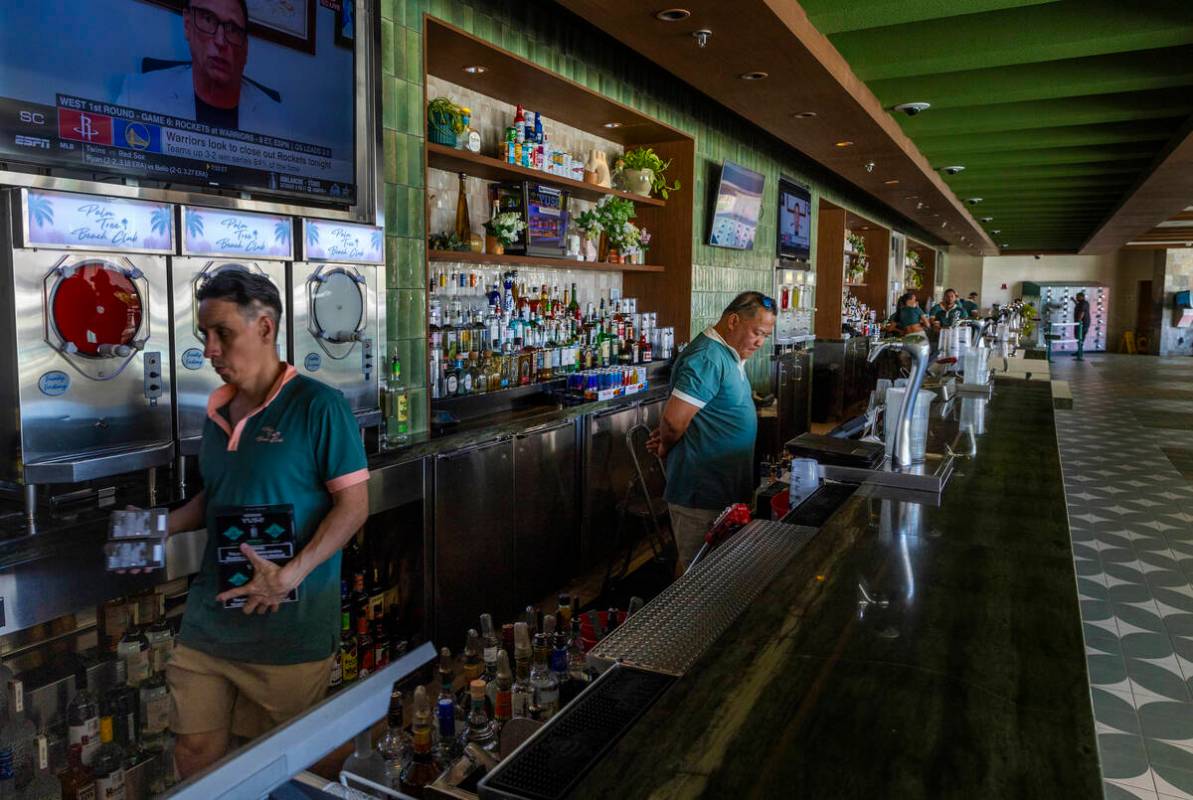 Bar staff stock up for an expected first day crowd at the new Palm Tree Beach Club at the MGM G ...