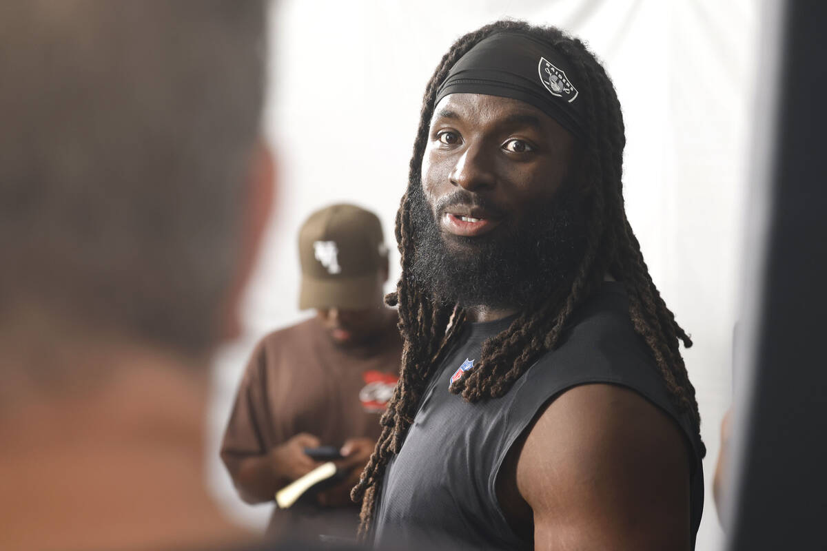 Raiders tight end Ian Thomas (80) speaks to the media after the team’s training camp at ...