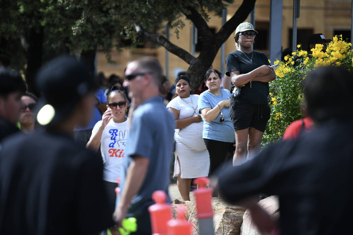 Parents and loved ones wait for their children to be released during a lockdown at Roy Martin M ...