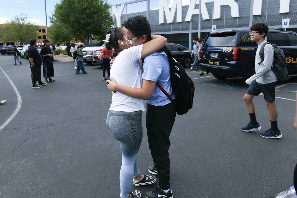Javier Tito gets a hug from his mother Francisca Tito after he was released during a lockdown a ...