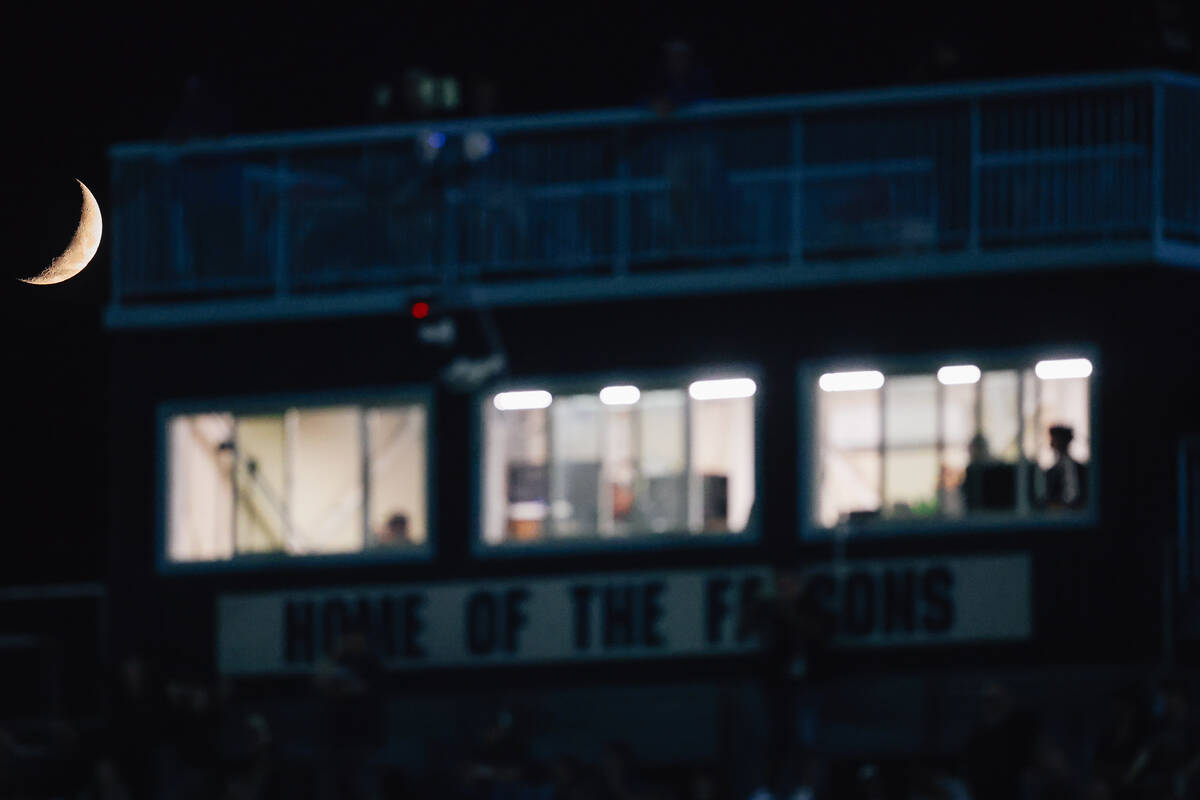 The moon glows during a high school football game between Liberty and foothill at Foothill High ...