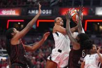 Las Vegas Aces' A'ja Wilson puts up a shot against Indiana Fever's Aliyah Boston ...