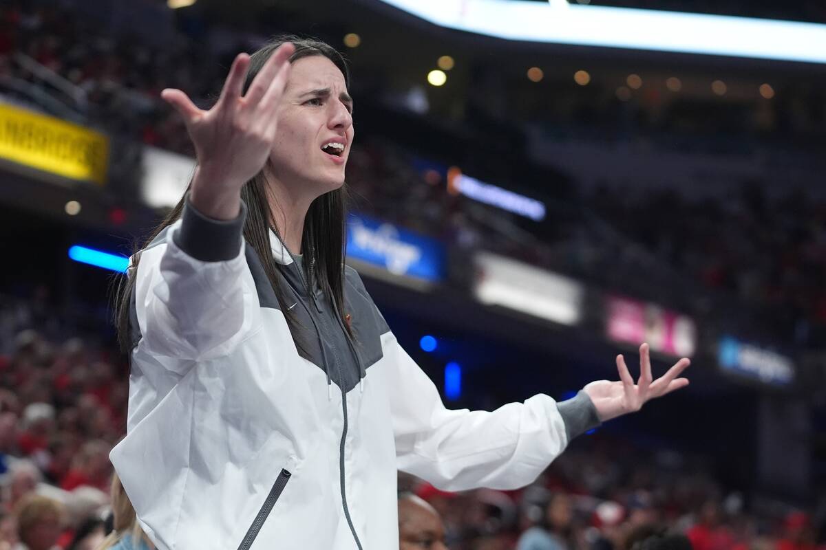 Indiana Fever's Caitlin Clark questions a call during second half of Game 3 of a WNBA bask ...