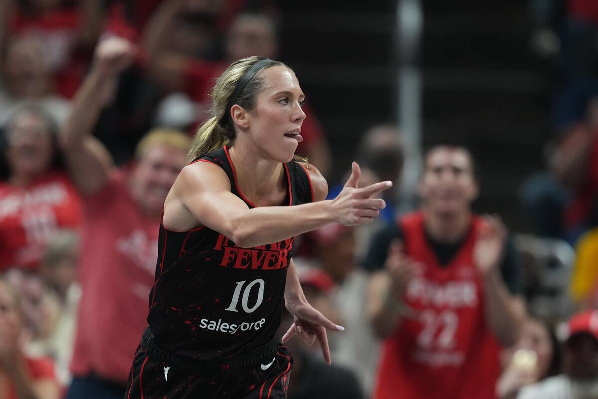 Indiana Fever's Lexie Hull reacts after hitting a 3-point shot during first half of Game 3 ...