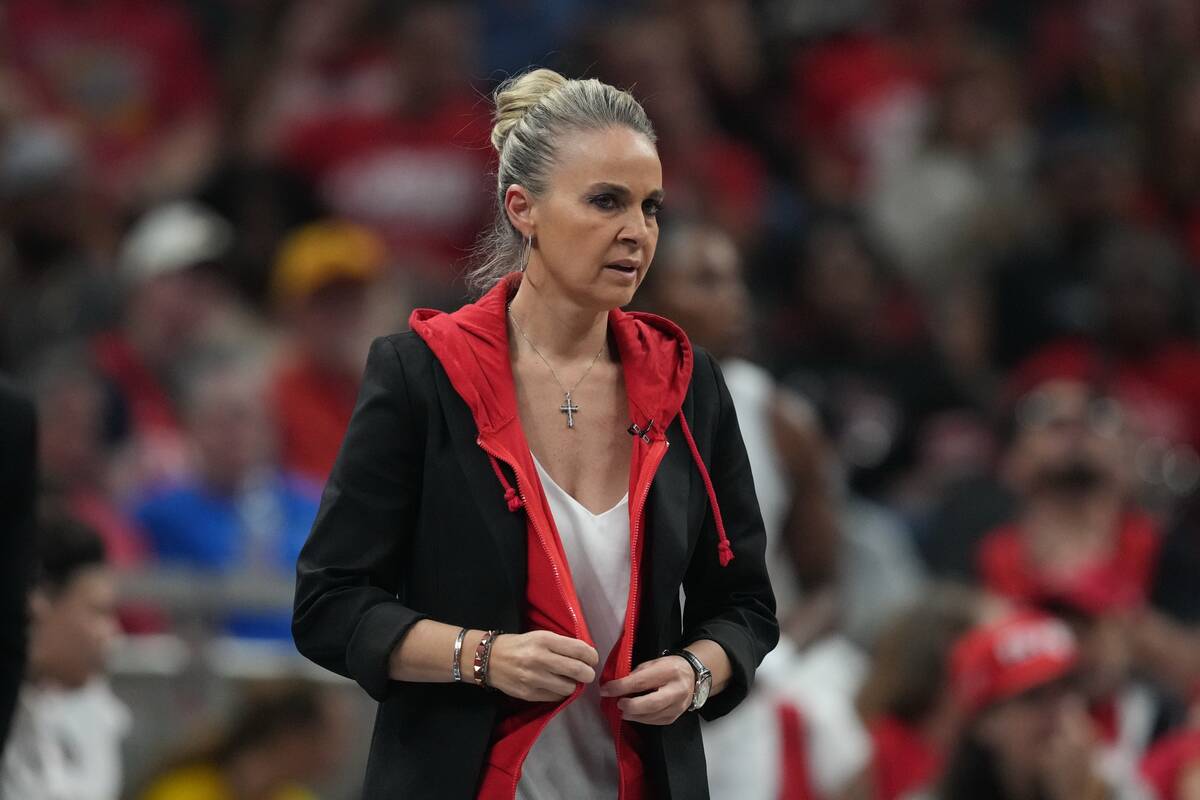 Las Vegas Aces head coach Becky Hammon watches during first half of Game 3 of a WNBA basketball ...