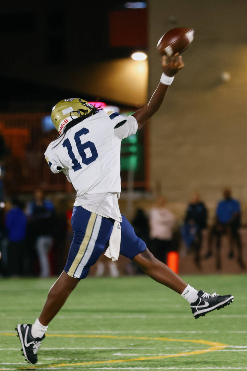 Spring Valley quarterback Camren Minton (16) tosses out a pass during the game on Friday, Sept. ...