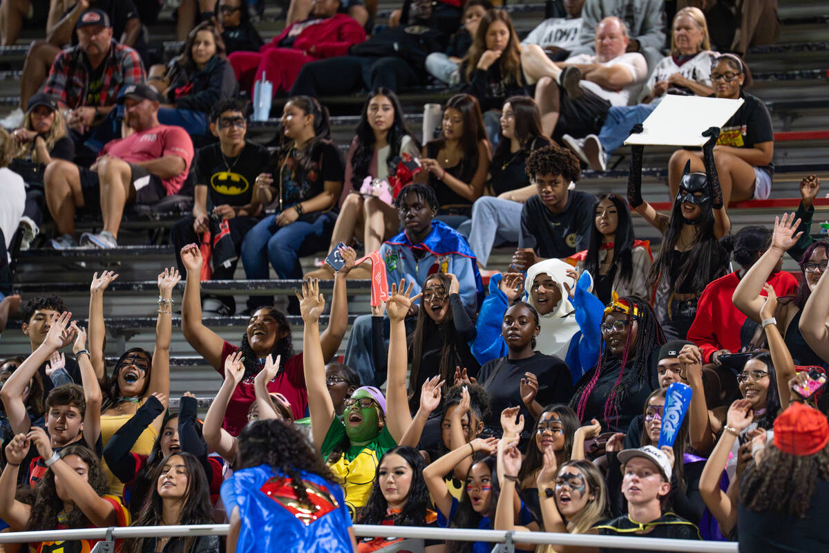 The Las Vegas student section is dressed in super hero attire for Friday night’s game ag ...