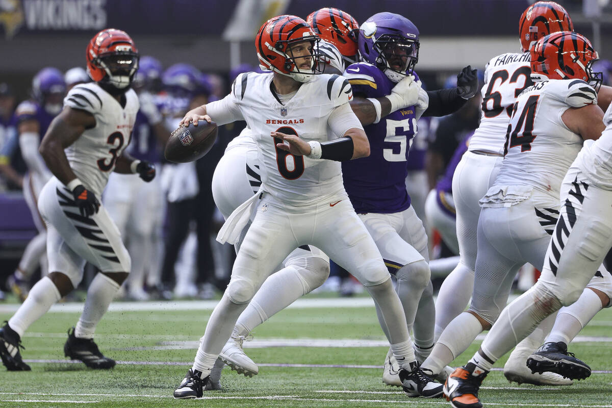 Cincinnati Bengals quarterback Jake Browning (6) throws the ball against the Minnesota Vikings ...