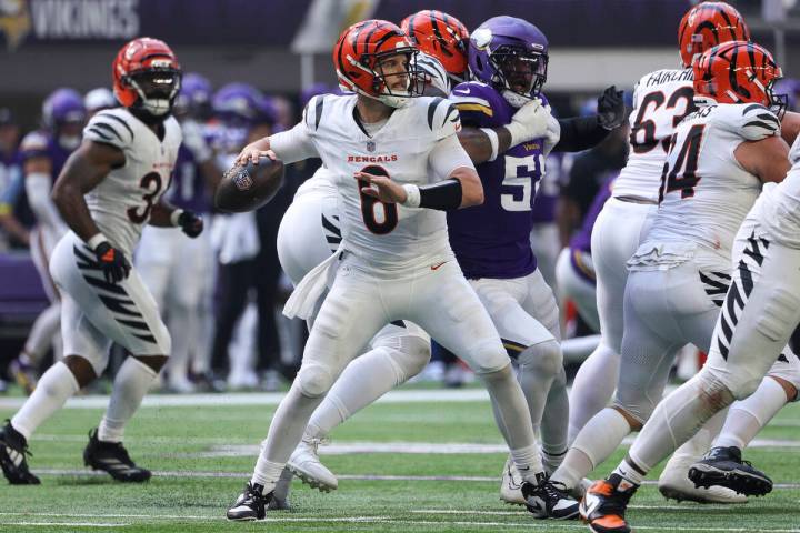 Cincinnati Bengals quarterback Jake Browning (6) throws the ball against the Minnesota Vikings ...