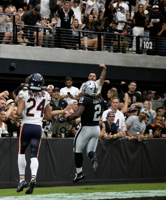 Raiders running back Ashton Jeanty (2) celebrates his 64-yard touchdown run with Chicago Bears ...