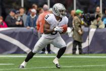 Raiders running back Zamir White (3) prepares to return a kickoff during the first half of an N ...