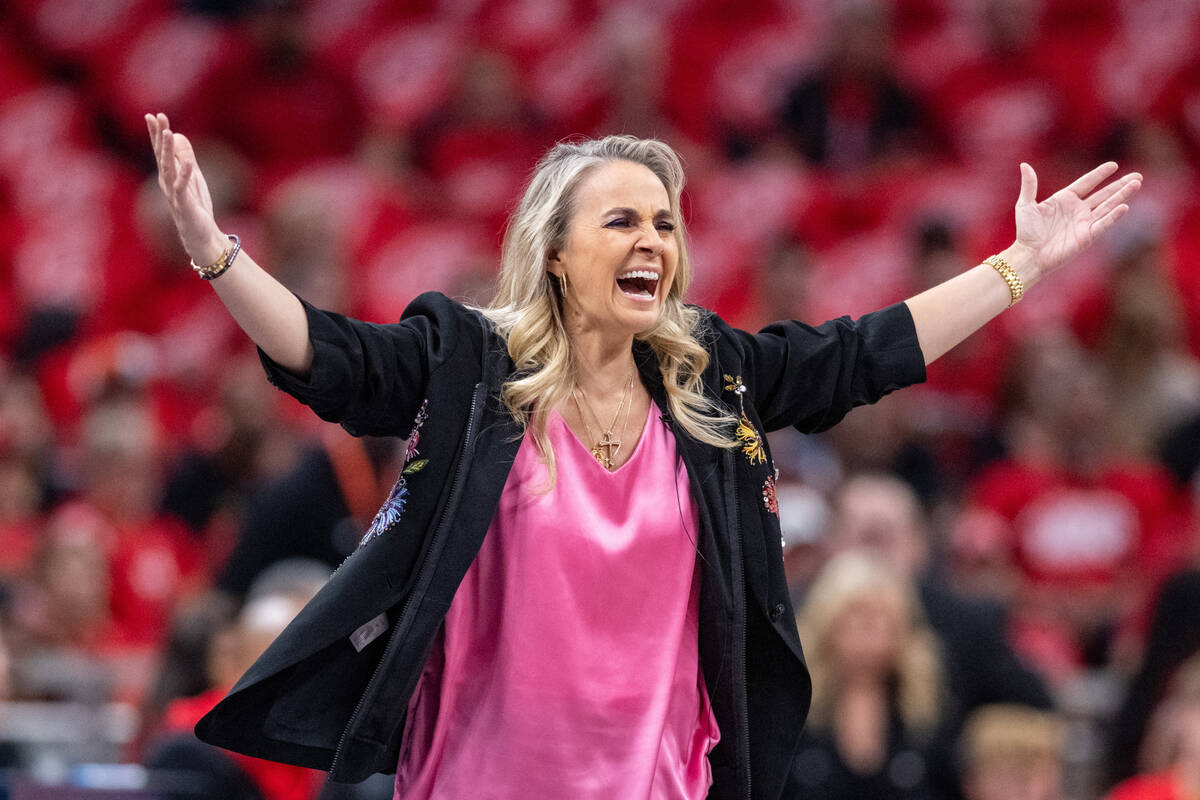 Las Vegas Aces head coach Becky Hammon reacts during the first half of Game 4 of a WNBA basketb ...