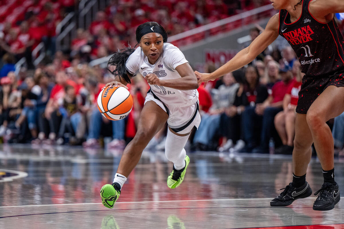 Las Vegas Aces guard Dana Evans (11) drives toward the basket during the first half of Game 4 o ...